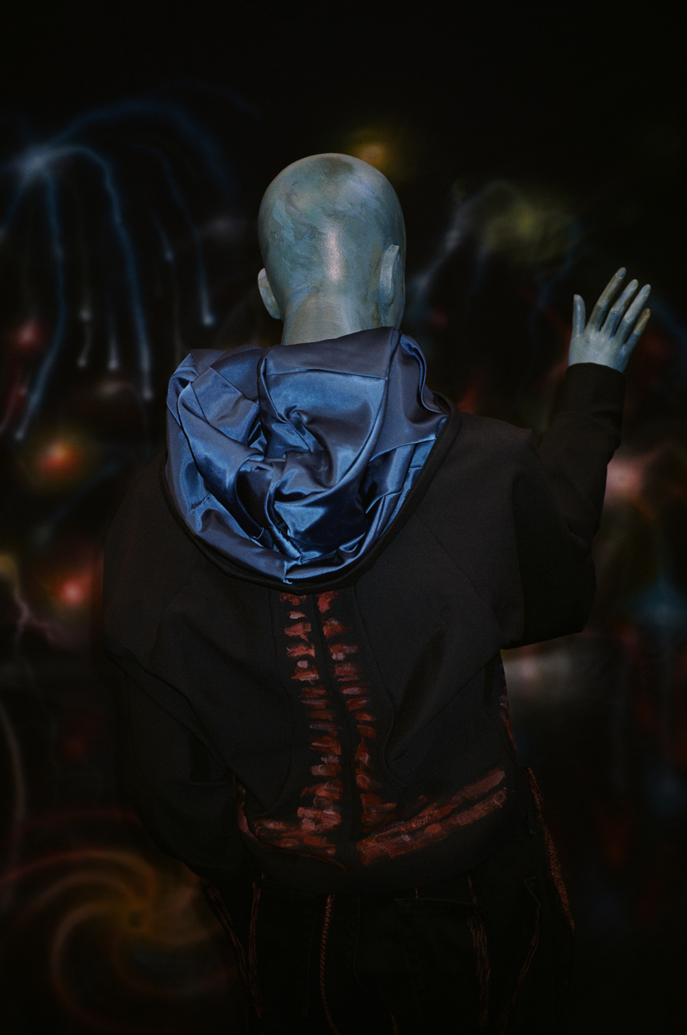 1sunsett 2orange 3Robinsparkes 4blue person 5Magic  6Painted clothing 7painting 8art 9clock 10time 11 11:11