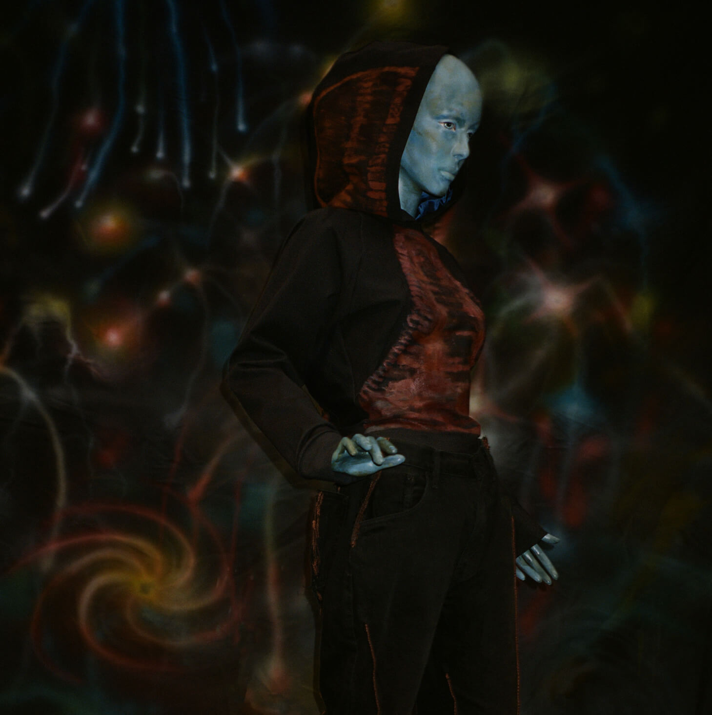 1sunsett 2orange 3Robinsparkes 4blue person 5Magic  6Painted clothing 7painting 8art 9clock 10time 11 11:11